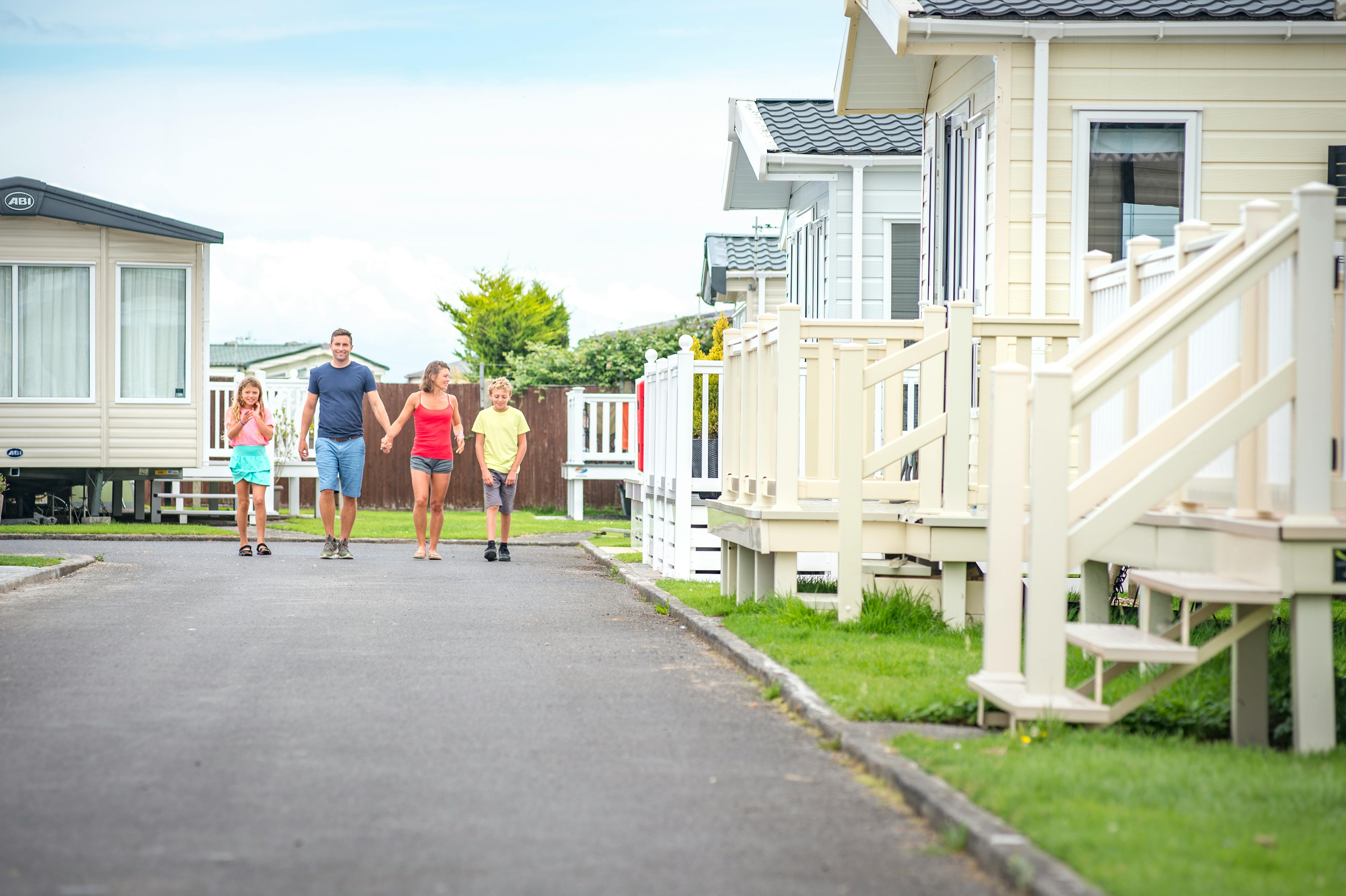 Family walking through Somerset Caravans