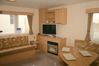 Bronze caravan with outdoor decking area
