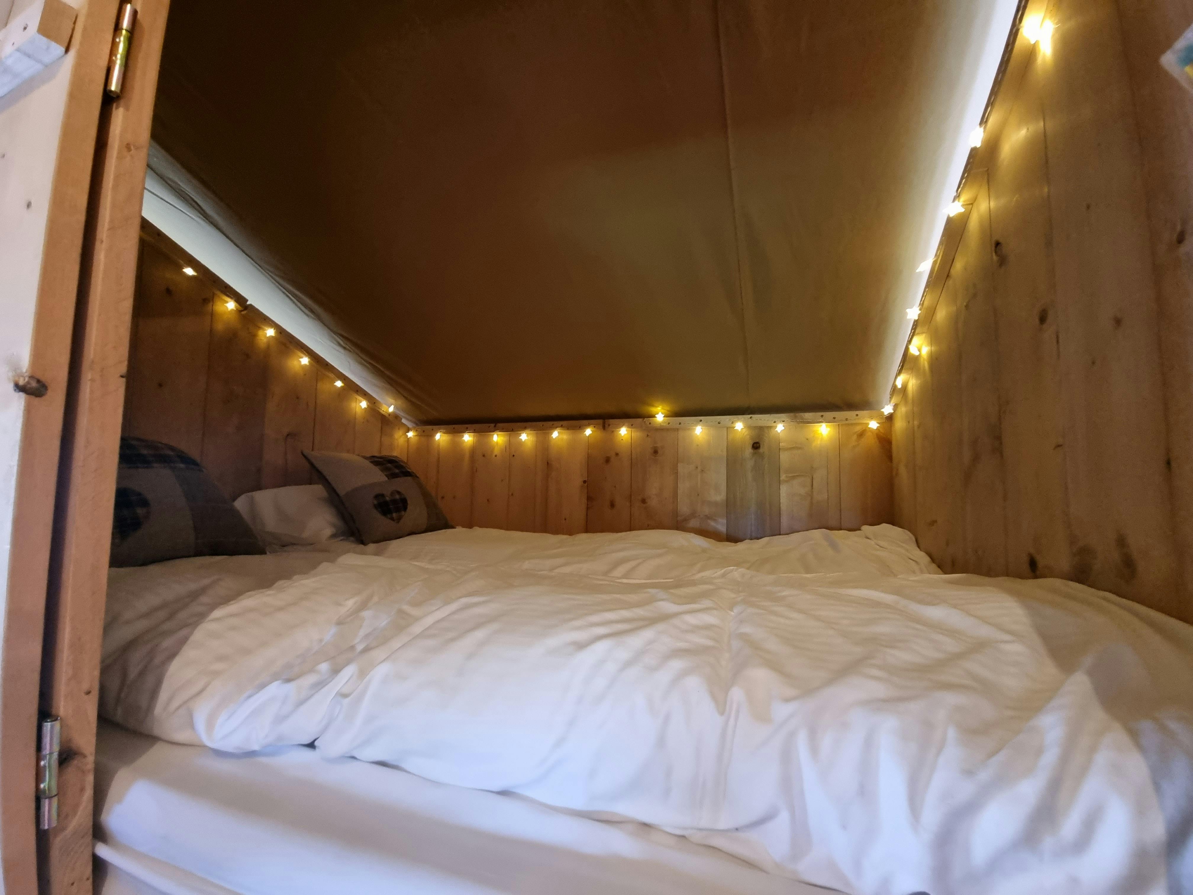 Inside cabin bed ¦ Safari Tent plus